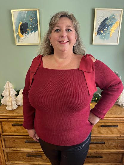Bow-tifully Festive Sweater